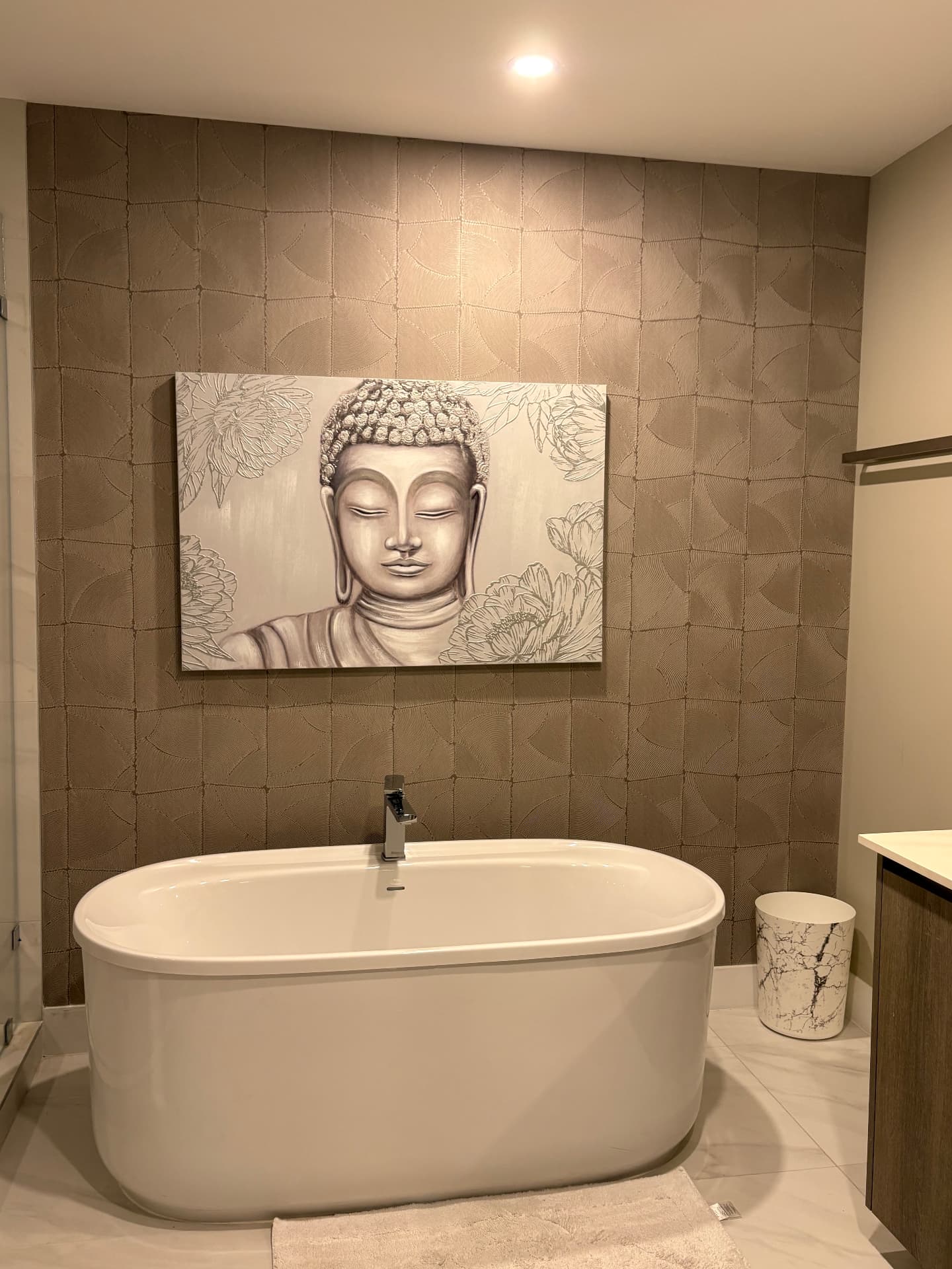 Aurora Sunny Isles bathroom with textured wallpaper behind bathtub
