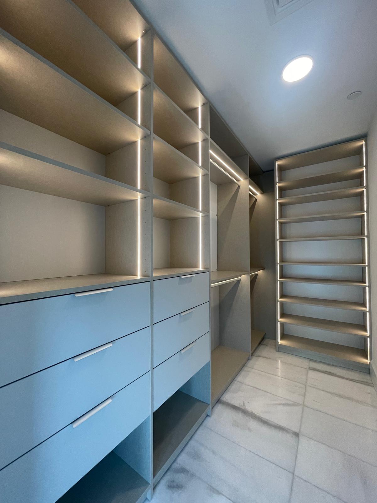 Missoni Baia custom walk-in closet with LED lighting and shoe wall